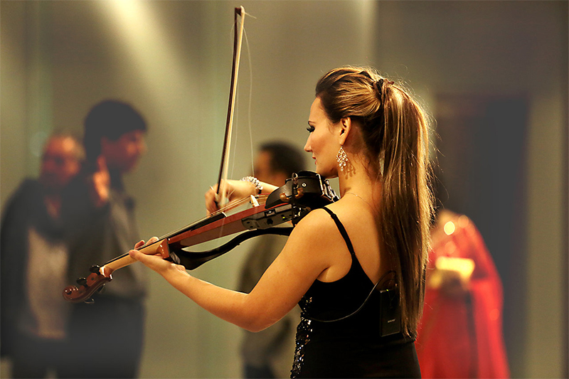 female violin player in dubai uae booking agency contract